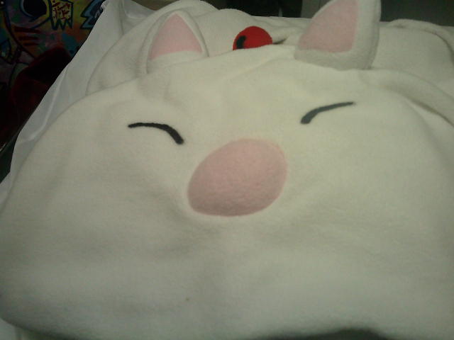 Hood of a Final Fantasy moogle onesie.